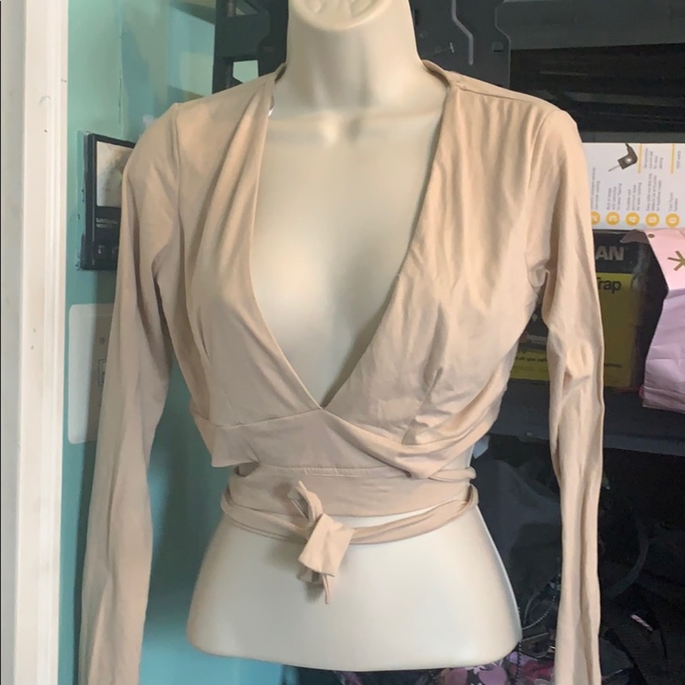 Beige plunge cut out wraparound crop top